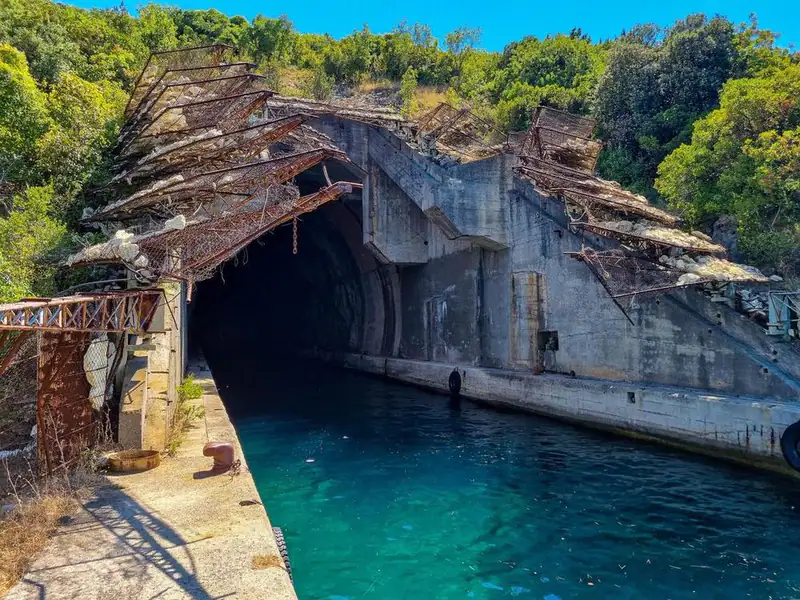 A Cold War submarine tunnel cut into the Luštica coast