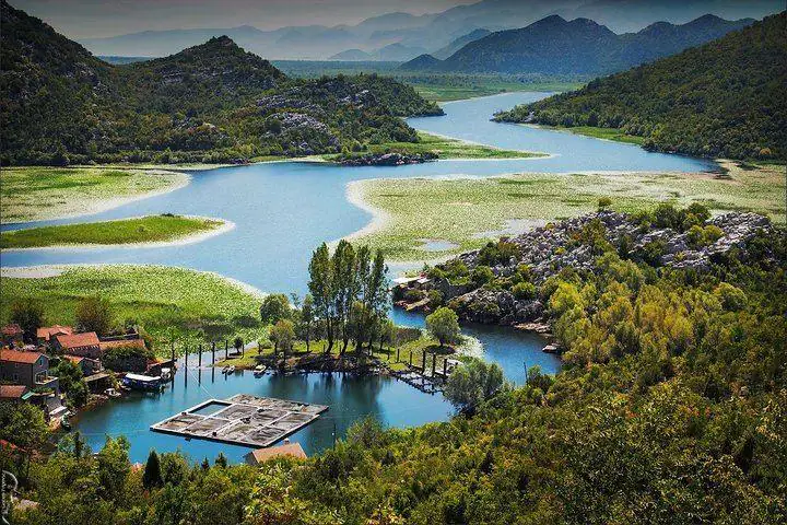 Skadar Lake winding through green hills