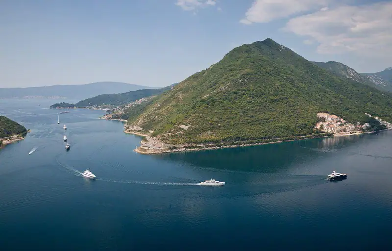Boats crossing the Verige strait in the Bay of Kotor